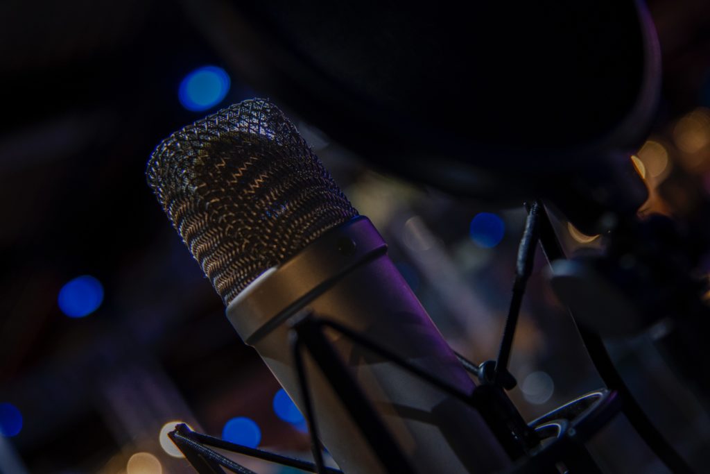 Microphone with a mesh wind screen
